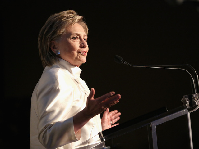 Defiant Clinton looks to explain loss in new memoir