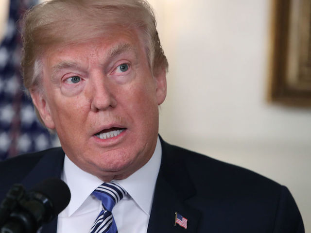 Trump issues memo stating transgender individuals are 'disqualified' from military